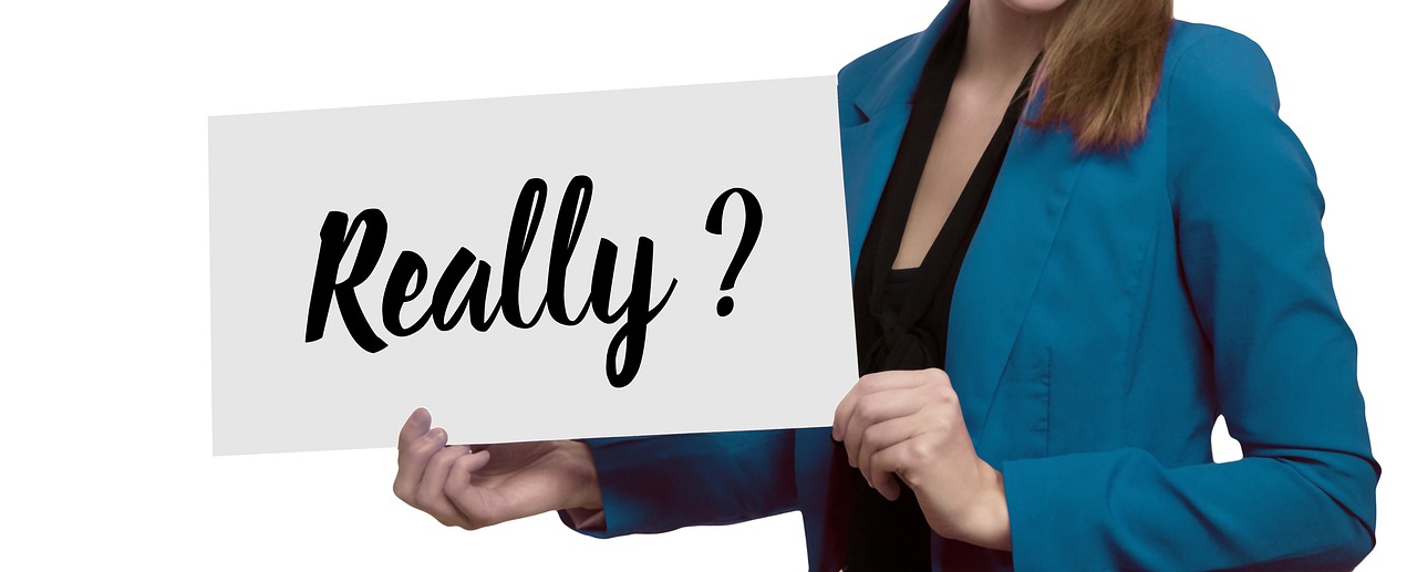 woman-3271589_1280.jpg woman holding sign